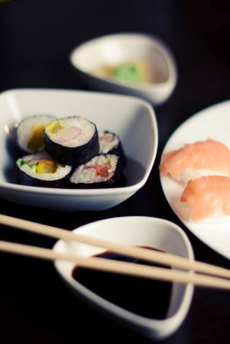 A convention is a large meeting of many people. The word convention can also mean a common custom such as dipping sushi in soy sauce.
